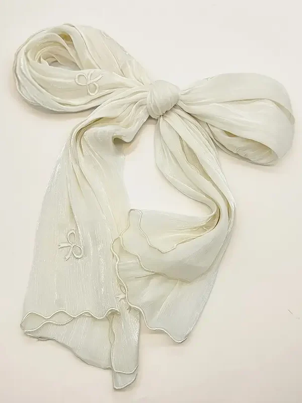 Embroidered bow shawl