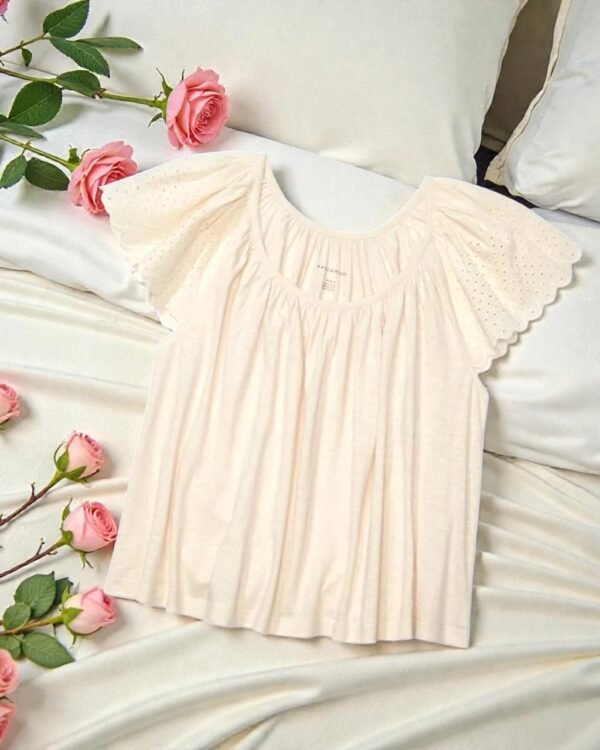 Embroidered Eyelet Details On Sleeves