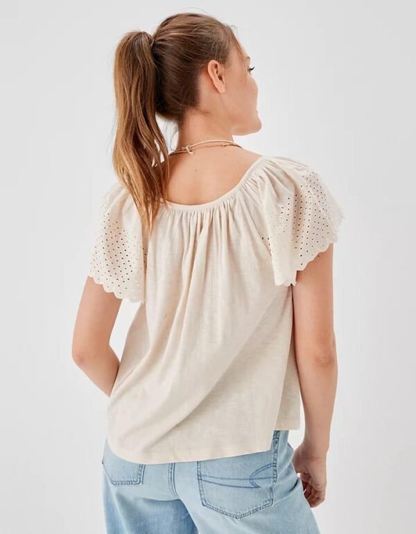 Embroidered Eyelet Details On Sleeves