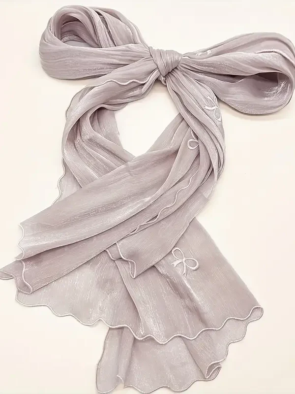 Embroidered bow shawl